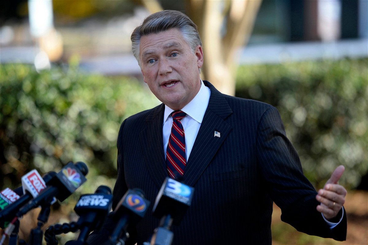 <i>David T. Foster III/Charlotte Observer/Getty Images/File via CNN Newsource</i><br/>Mark Harris answers questions at a news conference at the Matthews Town Hall in North Carolina.