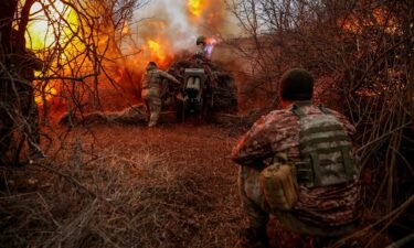 Ukrainian soldiers fire a D-30 howitzer towards Russian troops in Kherson region