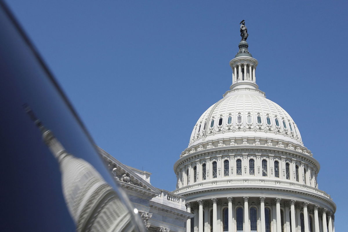 <i>Amanda Andrade-Rhoades/Reuters via CNN Newsource</i><br/>The dome of the U.S. Capitol is reflected in a window on  Capitol Hill in Washington