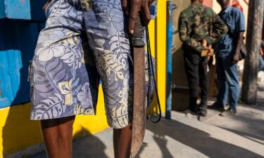 A bullet lies on a street in Port-au-Prince