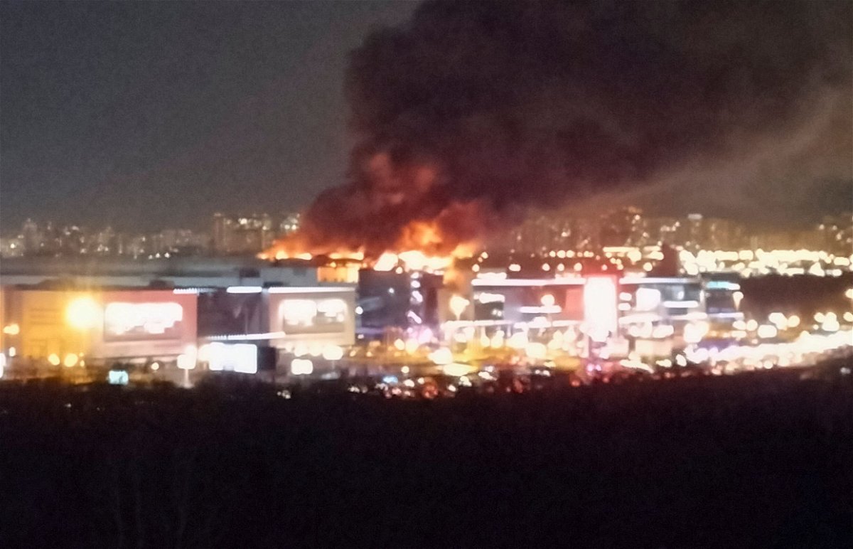 <i>Reuters via CNN Newsource</i><br/>Smoke rises above the burning Crocus City Hall concert venue following a reported shooting and blast in the outskirts of Moscow