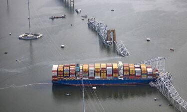 Workers continue to investigate and search for victims after the cargo ship Dali collided with the Francis Scott Key Bridge causing it to collapse yesterday