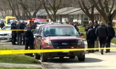 Emergency personnel on the scene of a home invasion and stabbing in Rockford