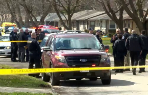 Emergency personnel on the scene of a home invasion and stabbing in Rockford