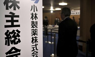 A person heads to the venue of Kobayashi Pharmaceutical Co.'s annual shareholders' meeting in the western Japan city of Osaka on Thursday