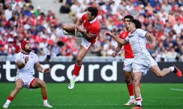 Wales' wing Louis Rees-Zammit (C) leaps to catch a high ball during the France 2023 Rugby World Cup Pool C match between Wales and Georgia at the Stade de la Beaujoire in Nantes