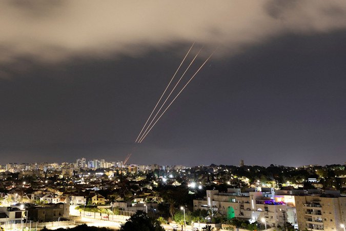 An anti-missile system operates after Iran launched drones and missiles towards Israel, as seen from Ashkelon, Israel, April 14.