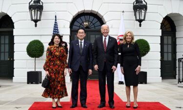 US President Joe Biden and First Lady Jill Biden welcome Japan's Prime Minister Fumio Kishida and his spouse Yuko Kishida at the South Portico of the White House in Washington