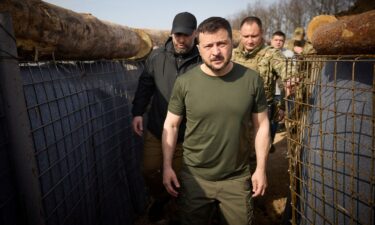 Ukraine's President Volodymyr Zelensky inspects new fortifications for Ukrainian servicemen near the Russian border in the Kharkiv region on Tuesday.