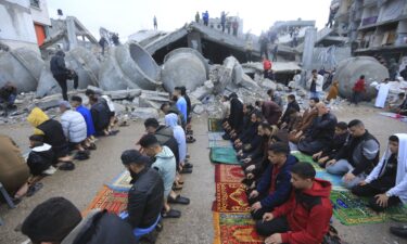 Palestinians gather at Gaza City's damaged Omari Mosque during Eid.