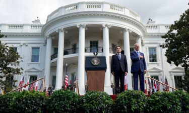 President Joe Biden and Japanese Prime Minister Fumio Kishida listen to the National Anthem during a State Arrival Ceremony on the South Lawn of the White House