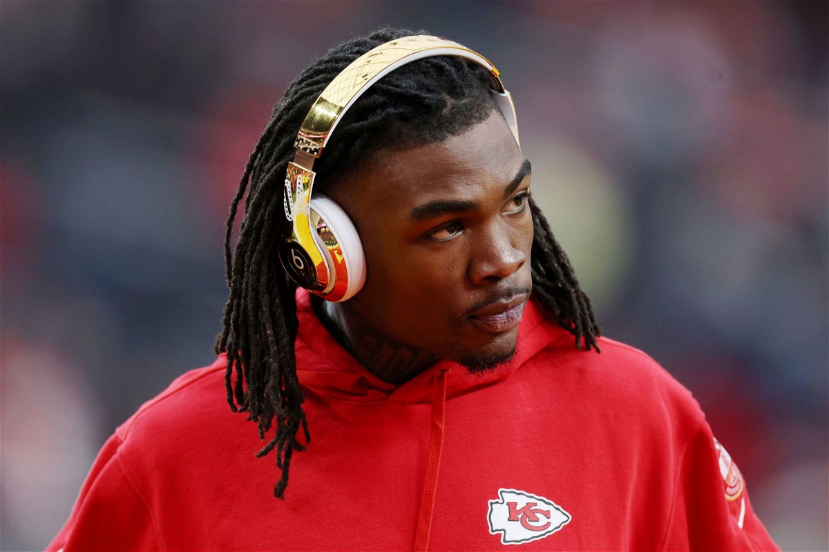 <i>Jamie Squire/Getty Images via CNN Newsource</i><br/>Rashee Rice warms up before the Super Bowl  in February. Dallas police have issued arrest warrants for Kansas City Chiefs wide receiver Rashee Rice and another man in connection with a six-car crash last month.
