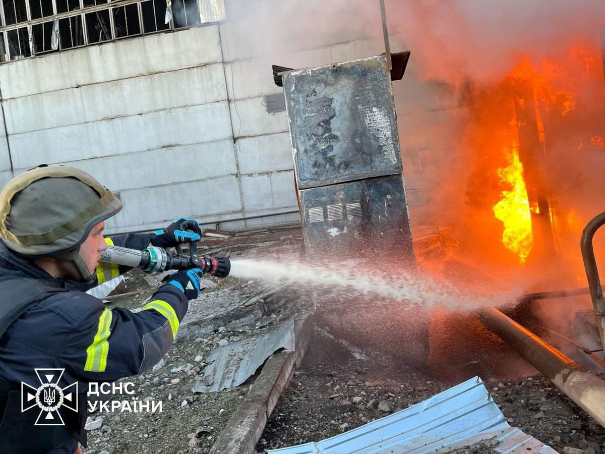 <i>State Emergency Service of Ukraine/Reuters via CNN Newsource</i><br/>A firefighter tackles a blaze after a Russian attack on a power station at an undisclosed location in Ukraine on April 11.