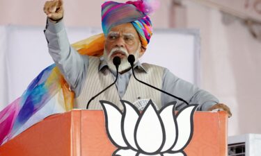 Prime Minister Narendra Modi addresses his supporters during an election campaign rally in Pushkar on April 6.