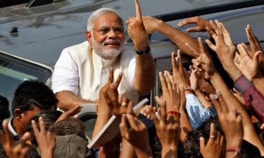 India's Prime Minister Narendra Modi addresses his supporters during an election campaign rally in Pushkar on April 6.