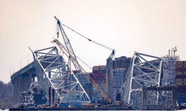 Debris is cleared from the collapsed Francis Scott Key Bridge as efforts begin to reopen the Port of Baltimore on March 31.