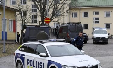 Police arrive after a shooting at Viertola school in Vantaa