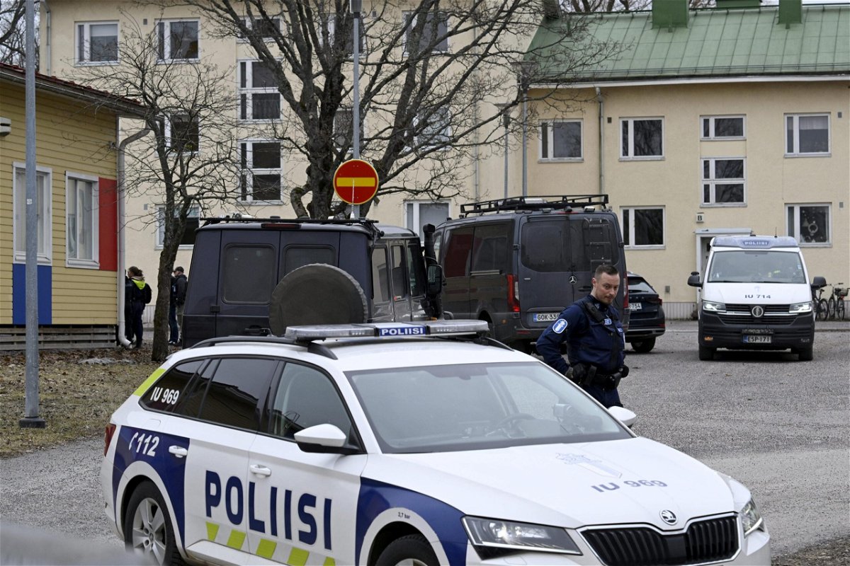 <i>Markku Ulander/Lehtikuva/Reuters via CNN Newsource</i><br/>Police arrive after a shooting at Viertola school in Vantaa
