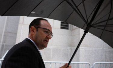 Michael Shvartsman walks following a hearing at the Manhattan Federal Court