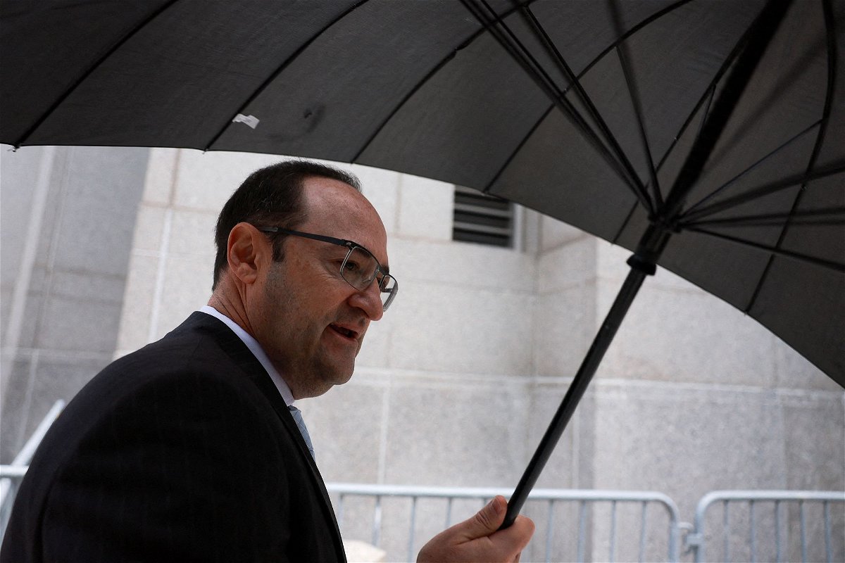 <i>Amr Alfiky/Reuters via CNN Newsource</i><br/>Michael Shvartsman walks following a hearing at the Manhattan Federal Court