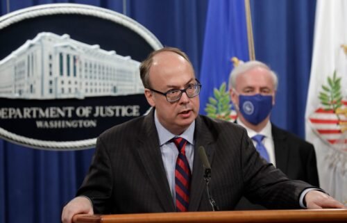 Then-Acting Assistant US Attorney General Jeffrey Clark speaks next to Deputy US Attorney General Jeffrey Rosen at a news conference. An attorney discipline panel in Washington