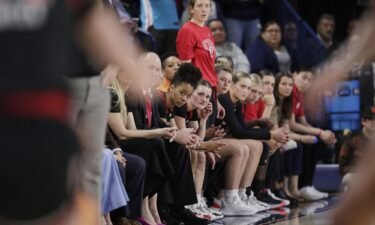 Players and staff on the Utah bench look on during their game against Gonzaga.