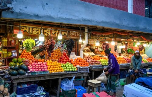 Vendors sell fruit at a wholesale market in Dhaka on January 21.