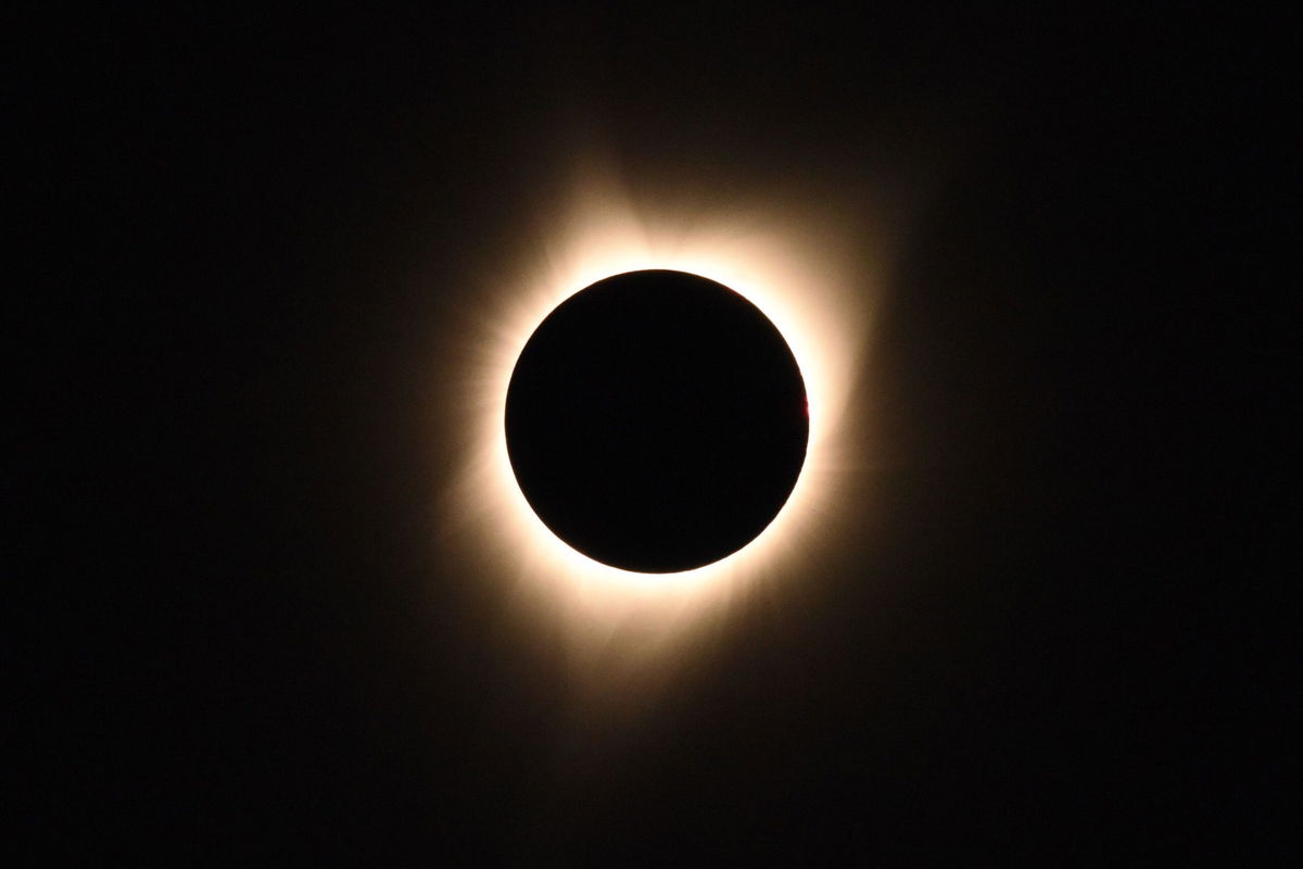 <i>Robyn Beck/AFP/Getty Images via CNN Newsource</i><br/>The sun's corona is visible as the moon passes in front of the sun during a total solar eclipse at Big Summit Prairie ranch in Oregon's Ochoco National Forest near the city of Mitchell on August 21