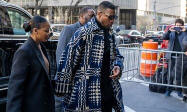 Jonathan Majors arrives with girlfriend Meagan Good for sentencing in his domestic abuse case at Manhattan Criminal Court on April 8 in New York City.