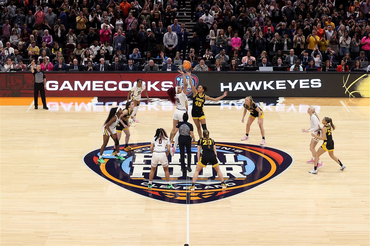 <i>Steph Chambers/Getty Images via CNN Newsource</i><br/>Kamilla Cardoso of the South Carolina Gamecocks and Hannah Stuelke of the Iowa Hawkeyes jump for the tip in the 2024 NCAA Women's Basketball Tournament National Championship. South Carolina beat Iowa 87-75.
