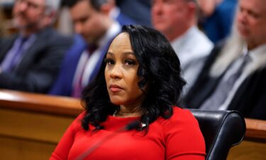 Fulton County District Attorney Fani Willis listens during the final arguments in her disqualification hearing at the Fulton County Courthouse on March 1