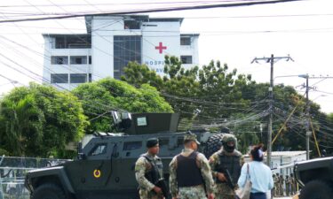 Army soldiers guard the surroundings of the Naval Hospital of Guayaquil