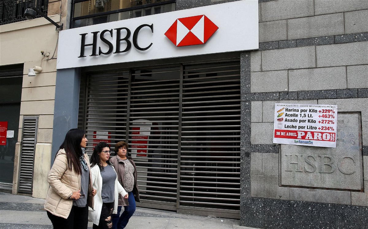 <i>Agustin Marcarian/Reuters/File via CNN Newsource</i><br/>Pedestrians walk past a closed HSBC branch during a national strike in Buenos Aires