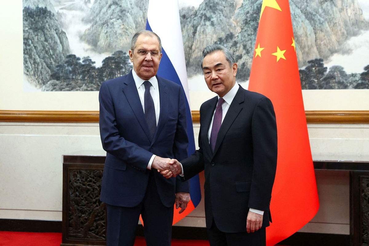 <i>Russian Foreign Ministry/Handout/Reuters via CNN Newsource</i><br/>Russia's Foreign Minister Sergey Lavrov shakes hands with China's Foreign Minister Wang Yi during a meeting in Beijing on April 9.