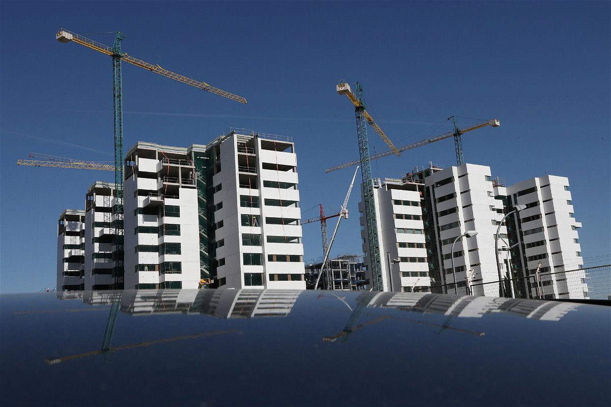 <i>Susana Vera/Reuters via CNN Newsource</i><br/>An apartment complex under construction in Madrid in 2018.