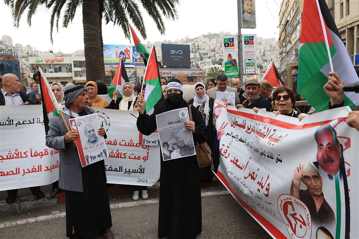<i>Alaa Badarneh/EPA-EFE/Shutterstock via CNN Newsource</i><br/>People protest following the death in an Israeli jail of terminally ill Palestinian activist and novelist Walid Daqqa