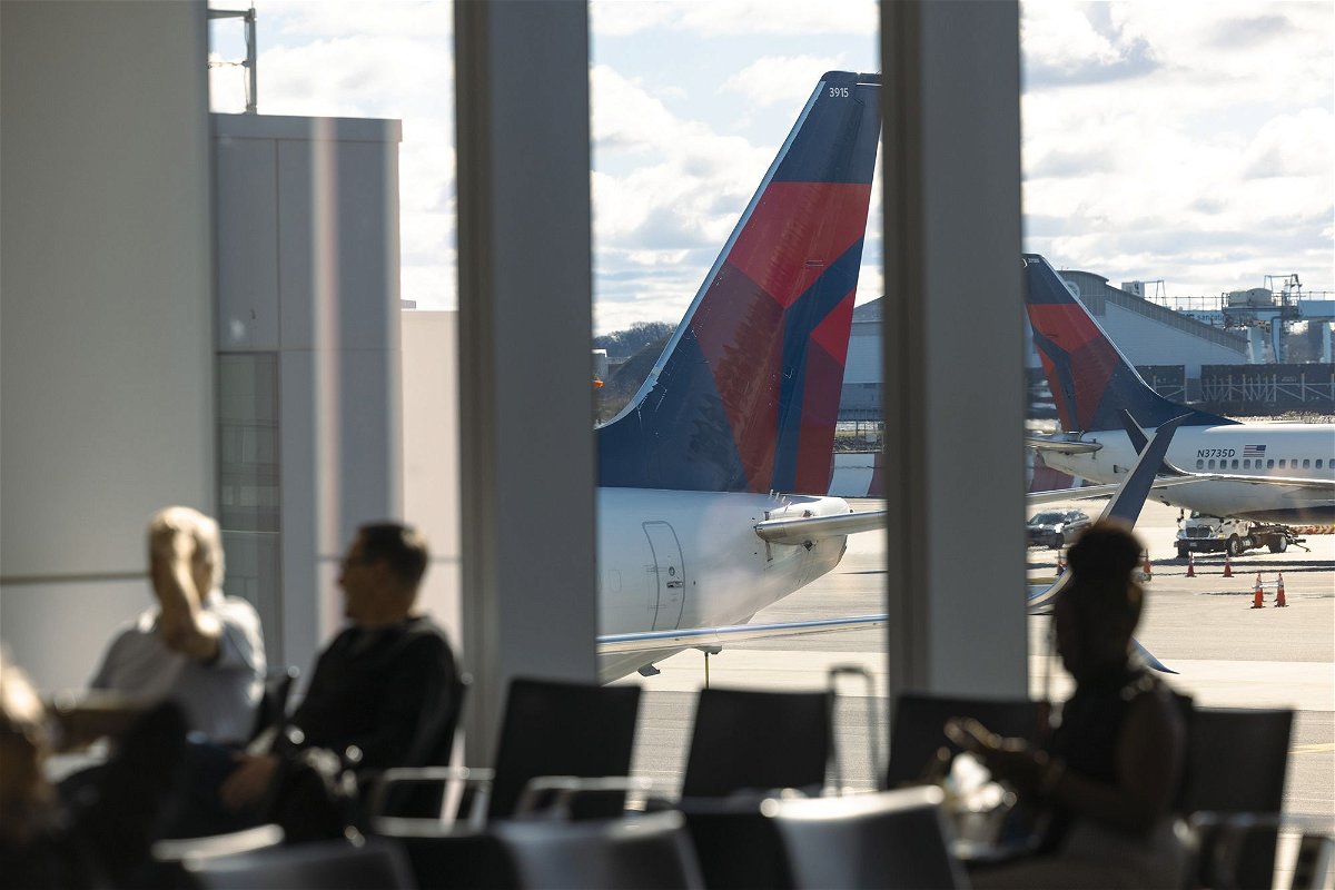 <i>Angus Mordant/Bloomberg/Getty Images via CNN Newsource</i><br/>Delta Air Lines planes line up at New York's LaGuardia Airport in an April 2024 photo.