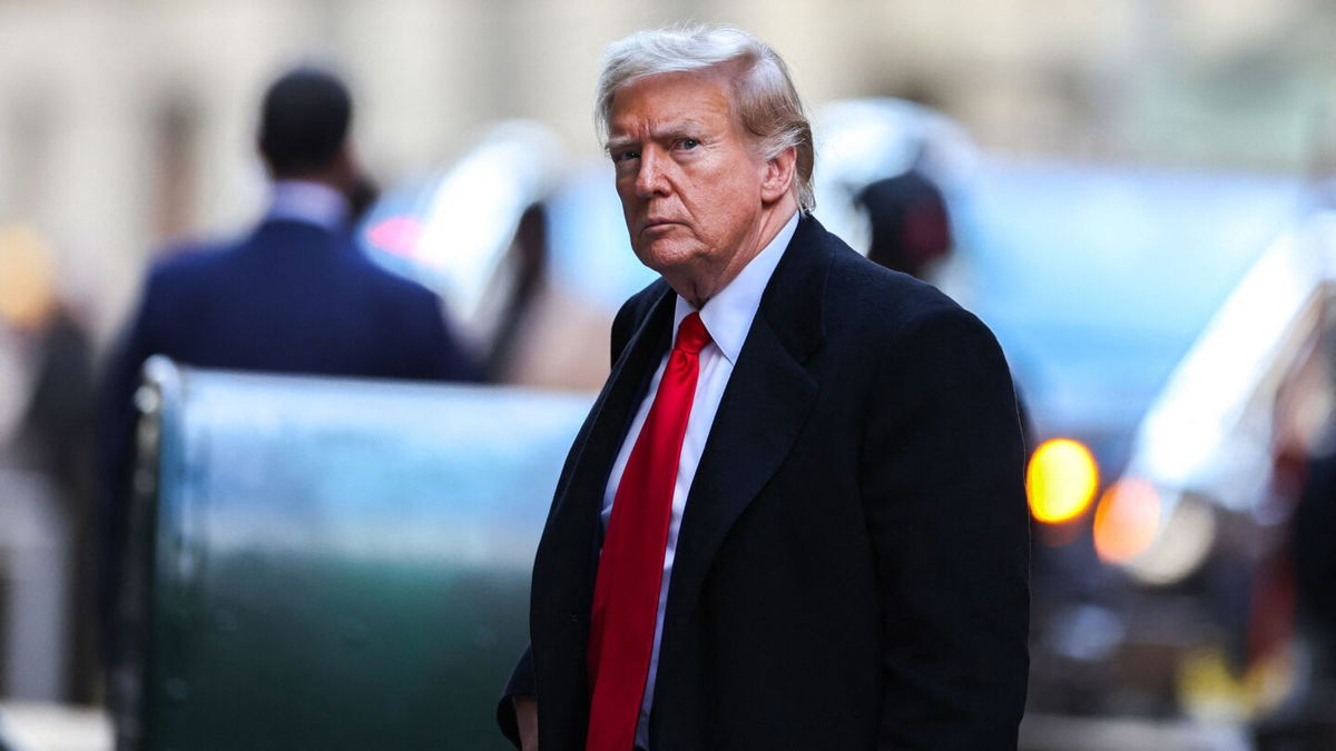 <i>Charly Triballeau/AFP/Getty Images via CNN Newsource</i><br/>Former President Donald Trump arrives at 40 Wall Street in New York City on March 25.