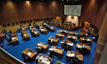 Arizona state senators convene on Senate floor at the Capitol on April 10