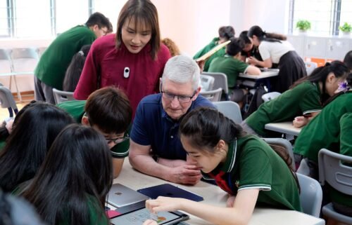 Apple CEO Tim Cook at a visit to a school in Hanoi on Wednesday