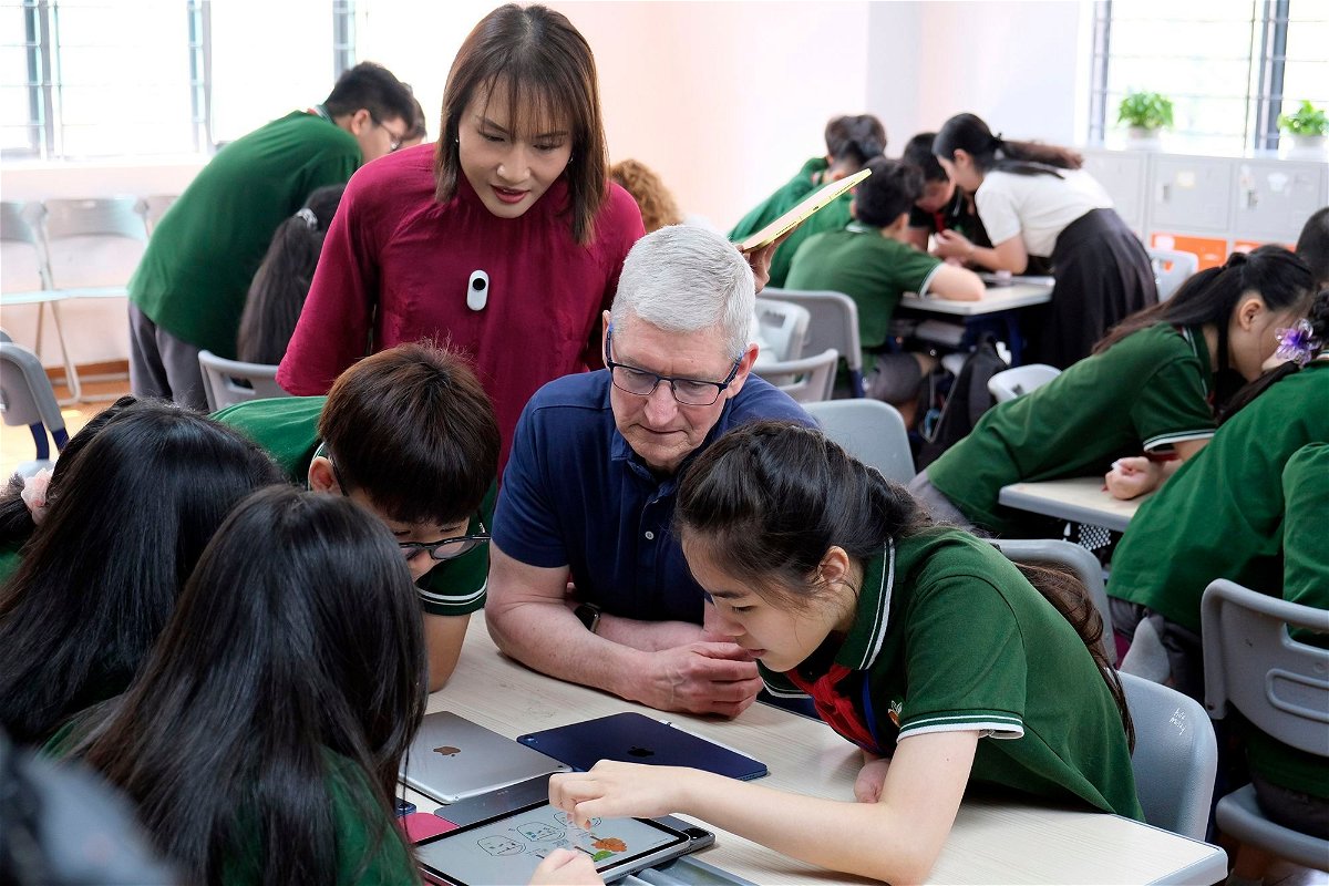 <i>Tuan Hung/VNExpress/AP via CNN Newsource</i><br/>Apple CEO Tim Cook at a visit to a school in Hanoi on Wednesday