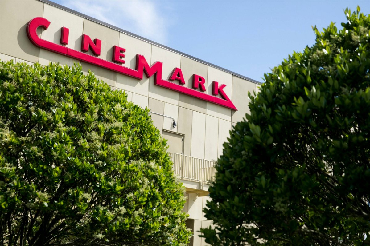<i>Kristoffer Tripplaar/Sipa/File via CNN Newsource</i><br/>A logo sign outside of a Cinemark movie theater location in Chesapeake