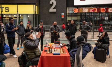 People celebrate as Tunde Onakoya marks 46 hours for consecutively playing a chess game in Times Square