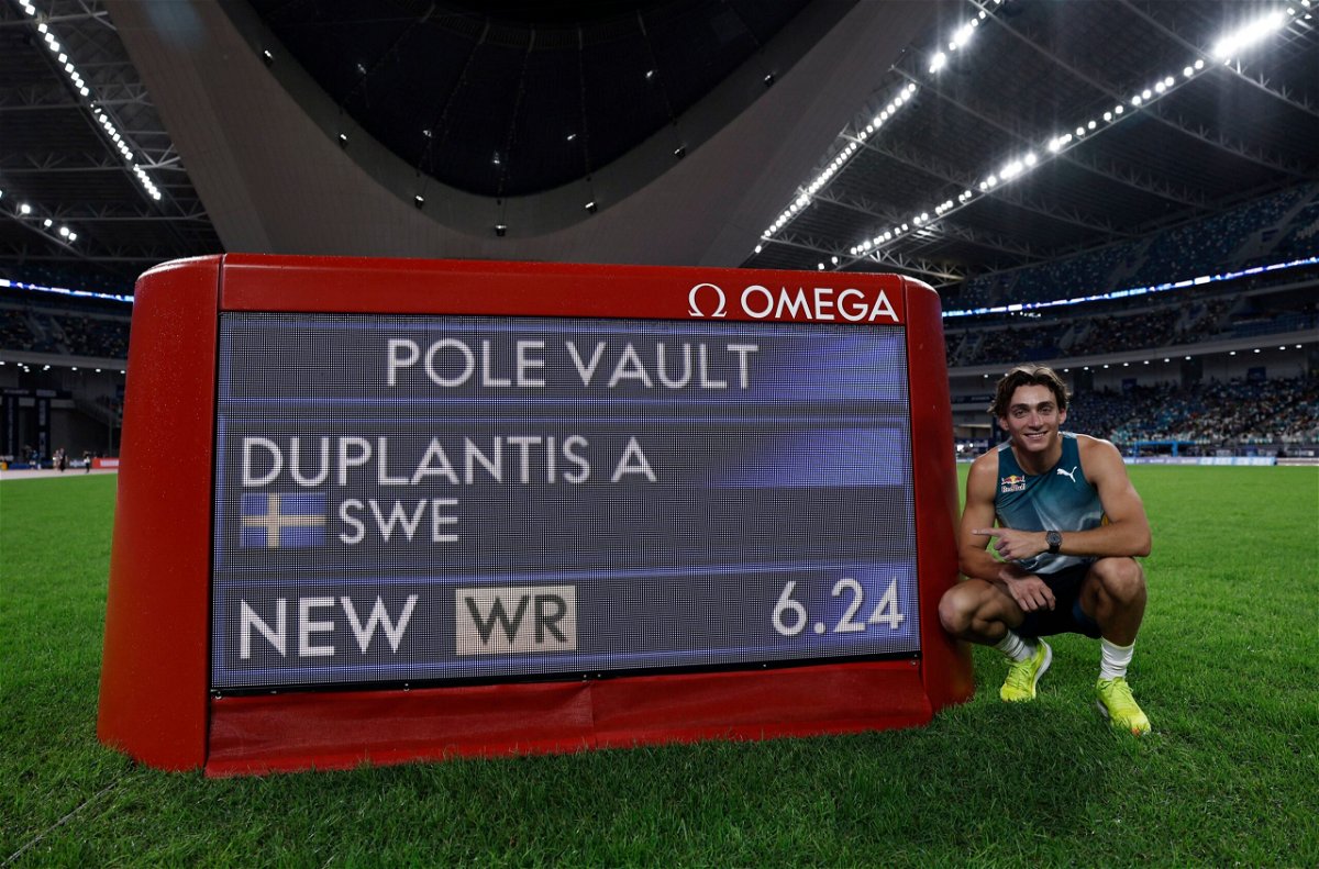 <i>Tingshu Wang/Reuters via CNN Newsource</i><br/>Sweden's Armand Duplantis celebrates after winning the men's pole vault and setting a new world record.