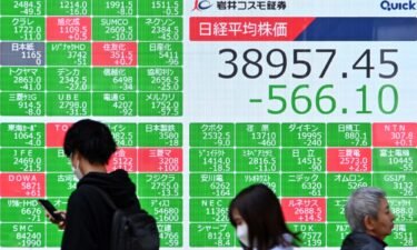 An electronic board showing prices of shares on the Nikkei index in Tokyo on Monday.