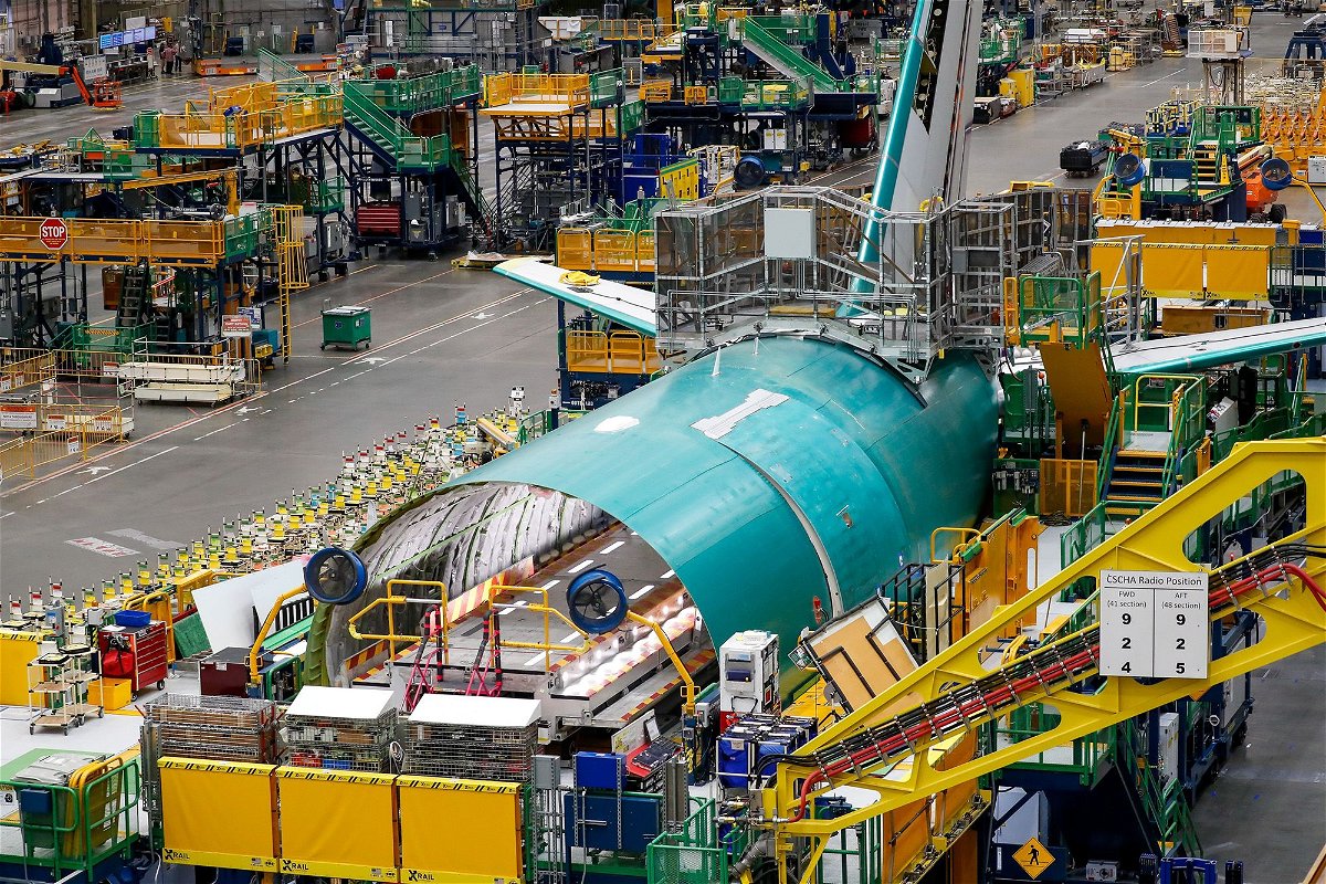 <i>Jennifer Buchanan/The Seattle Times/Pool/AP via CNN Newsource</i><br/>The rear fuselage section of a 777 freighter is seen at Boeing's Everett