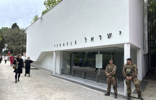 Italian soldiers patrol the Israeli national pavilion at the Biennale contemporary art fair in Venice
