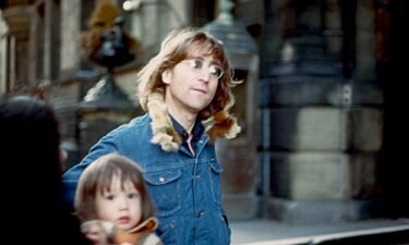 Former Beatle John Lennon is photographed with his wife Yoko Ono and son Sean Lennon in New York three years before he was killed.