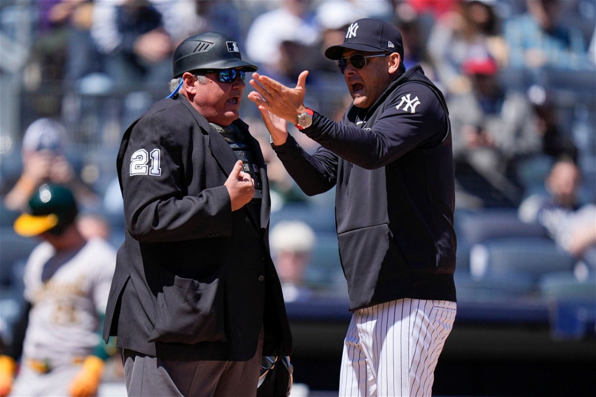 <i>Seth Wenig/AP via CNN Newsource</i><br/>Yankees manager Aaron Boone (R) argues with umpire Hunter Wendelstedt during New York's game against the Oakland Athletics on Monday.