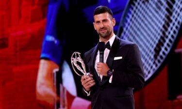 Novak Djokovic accepts the Laureus World Sportsman of the Year award on stage during a ceremony in Madrid